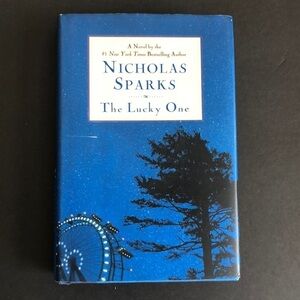 𝅺the Lucky One by Nicholas Sparks Book